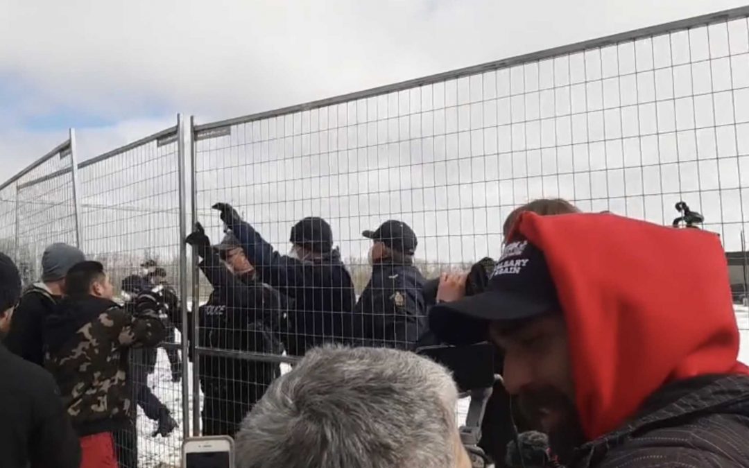 Overwhelming Police Presence Descends on Canadian Church as Protesters Tear Down Barricade